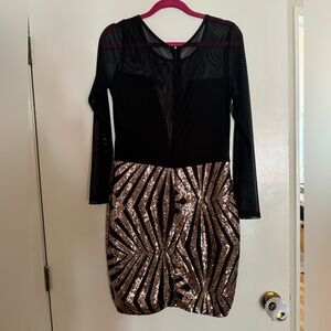 Stunning dress with mesh top and gorgeous sequin pattern bottom. NWOT
